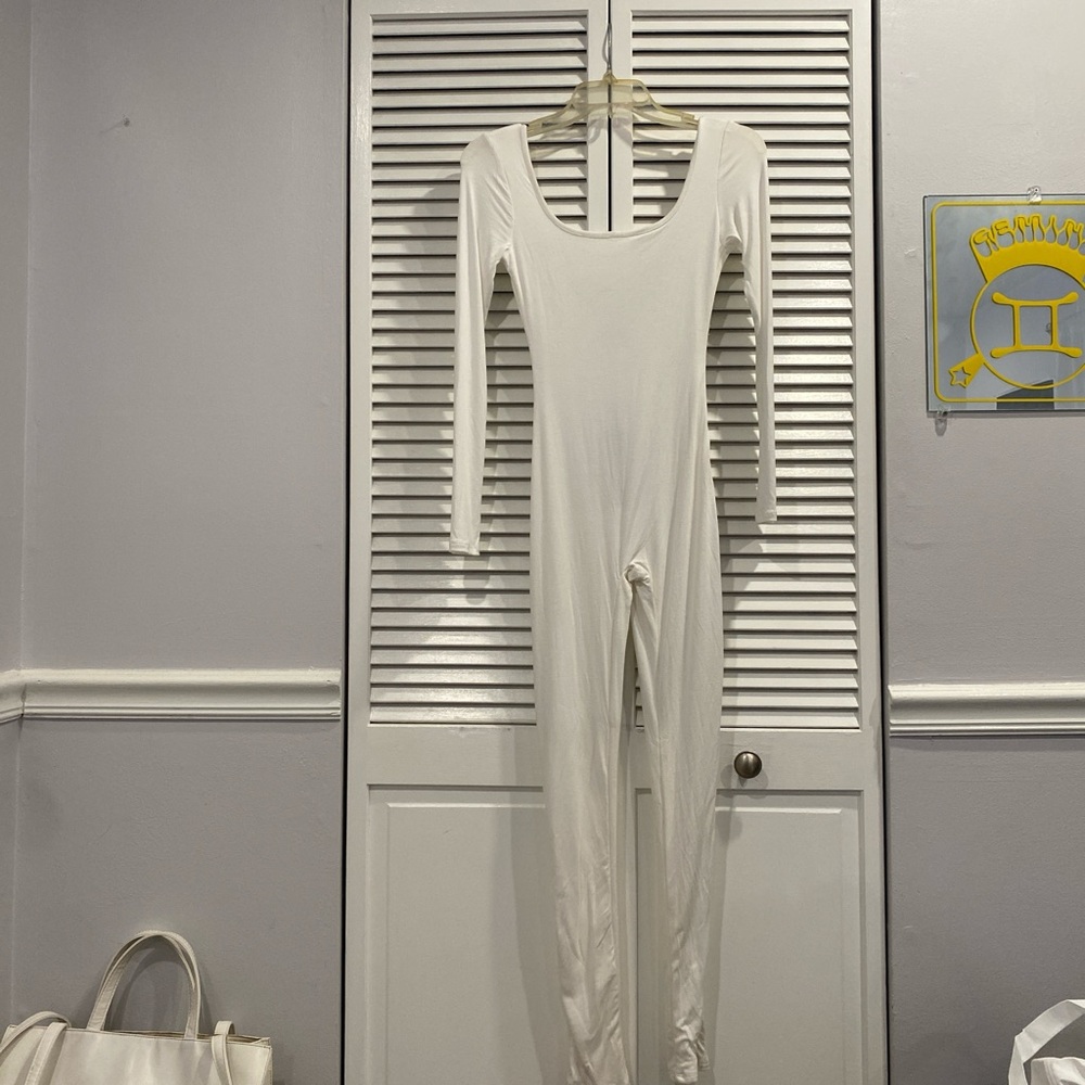 White long sleeve body con jumpsuit size XS